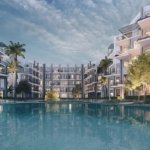 Investment Property in Majra Resort Hurghada overlooking the Red Sea with modern architecture and beachfront lifestyle.
