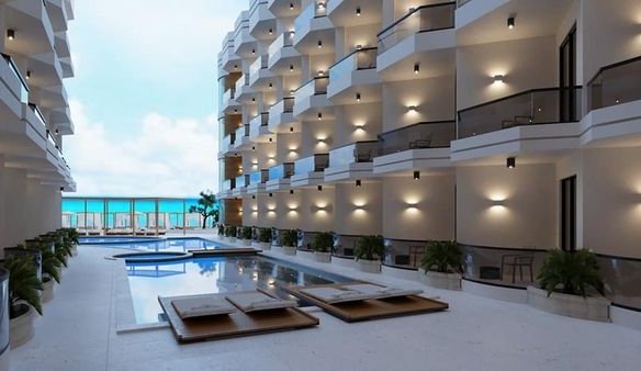 Luxury swimming pool at Storia Del Mare surrounded by elegant architecture and relaxing resort vibes.