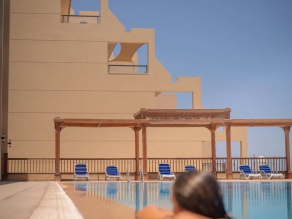 Modern apartments at The View Old Sheraton with balconies overlooking the Red Sea.