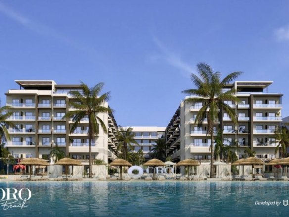Front view of Oro Beach Resort showcasing elegant modern architecture and luxurious seaside design.