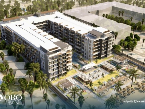 Front view of Oro Beach Resort showcasing elegant modern architecture and luxurious seaside design.