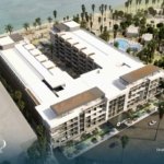 Front view of Oro Beach Resort showcasing elegant modern architecture and luxurious seaside design.