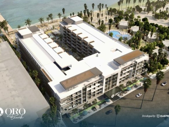 Front view of Oro Beach Resort showcasing elegant modern architecture and luxurious seaside design.