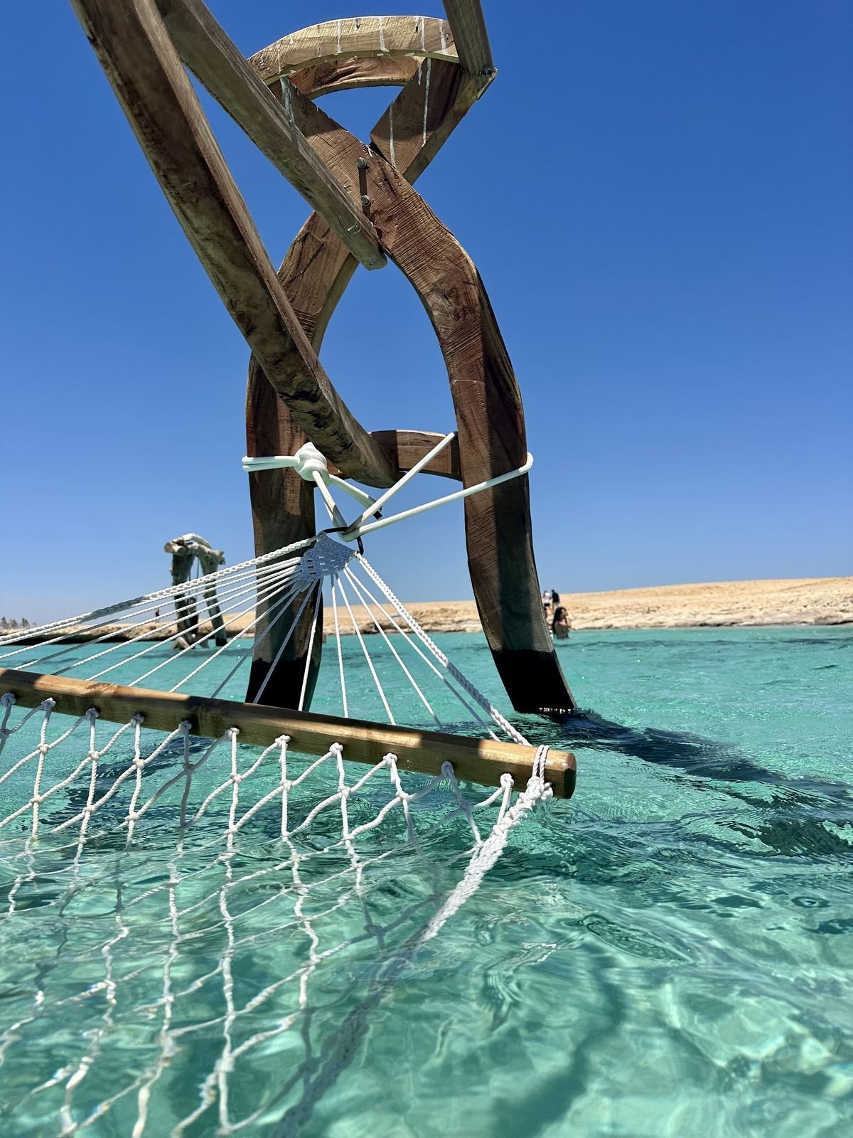 Night-time shot of a lit residential complex in Soma Bay showing professional landscaping and security.