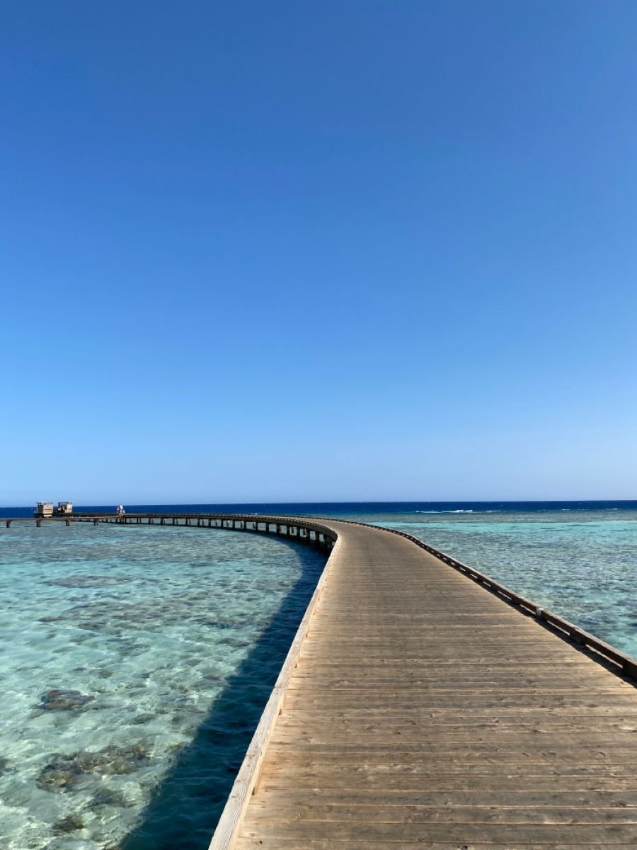 Panoramic view of the Cascades Championship Golf Course with luxury homes lining the green fairways.