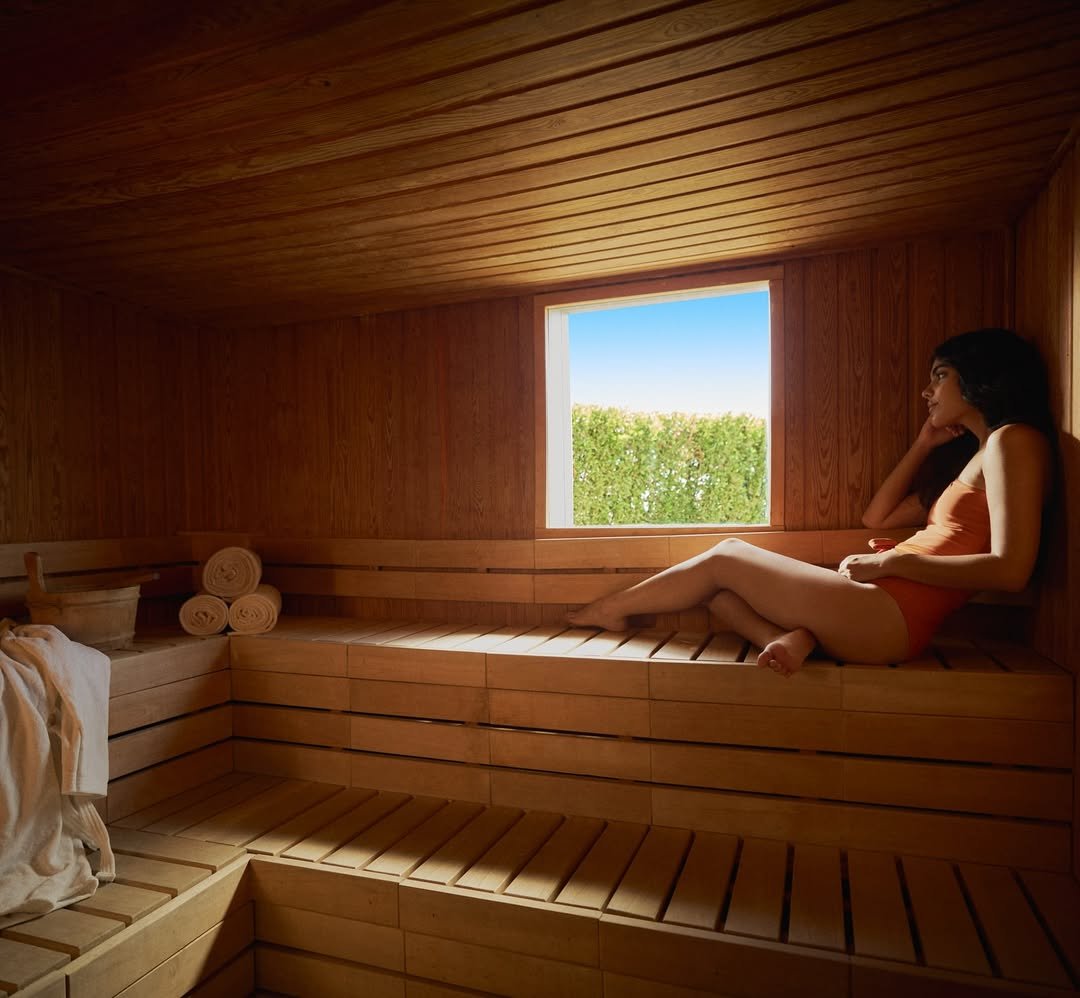 Resort-style amenities including dining, pools, and fitness centers at Ras Soma Residences.