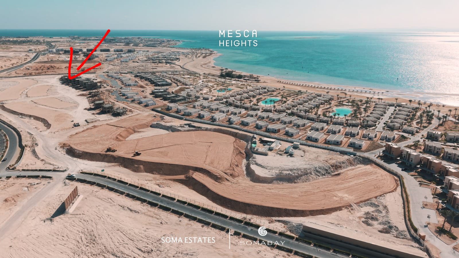 Modern white-washed villa with a private infinity pool overlooking the Red Sea coast in Soma Bay.