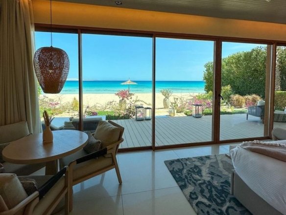 Buy property Hurghada Egypt 2026 Modern luxury apartment balcony with a panoramic view of the Red Sea in Hurghada, Egypt 2026.