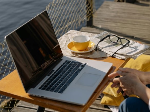 Remote work lifestyle in Hurghada with laptop by the Red Sea beach