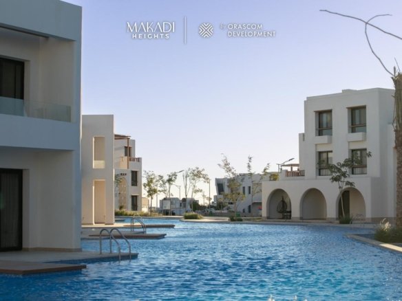 Siyal Makadi Heights master-planned community with pools, greenery, and lagoons