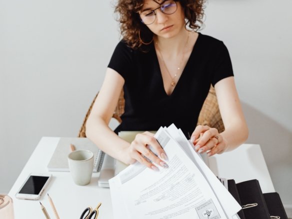 Real estate license professional reviewing property listings and career opportunities available with a real estate license in 2026.