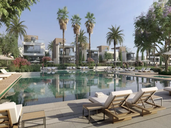 IL Bayou à Sahl Hasheesh avec résidences de luxe, piscines, jardins paysagers et vue sur la mer Rouge.