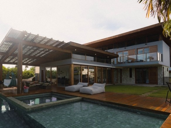 Modern eco-luxury residential resort in Hurghada featuring roof-mounted solar panels and energy-efficient architecture.