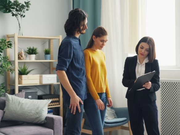 Real estate agent showing housing market data proving whether big investors really buying up all the homes