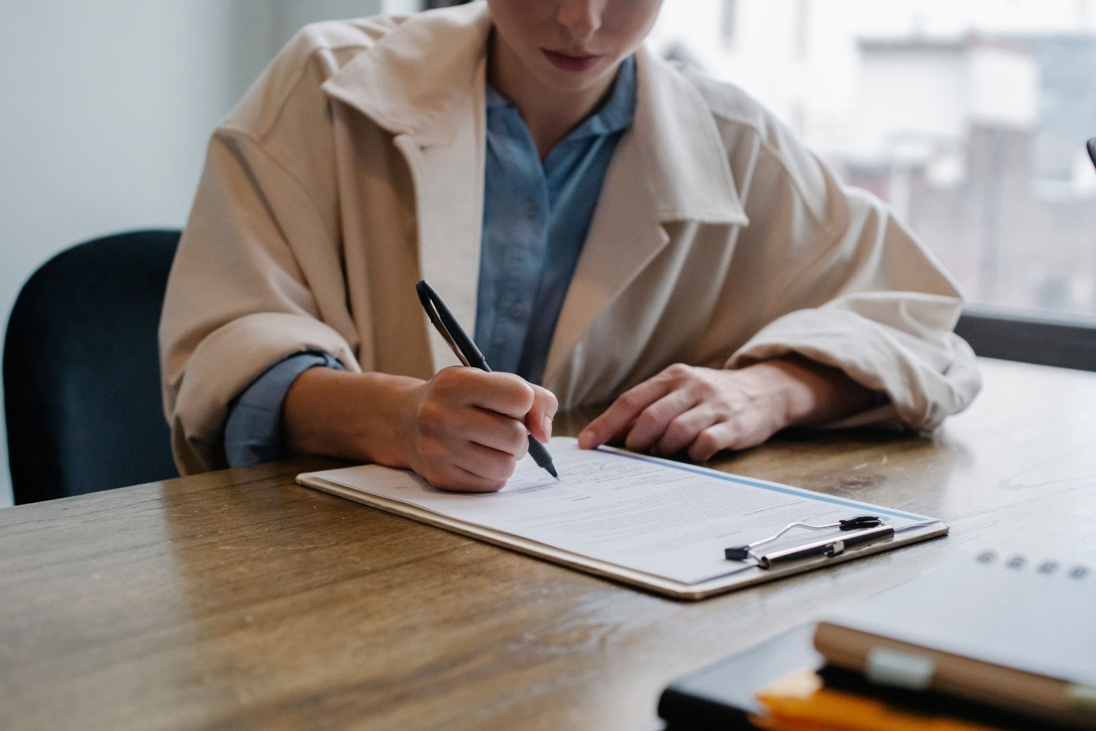 Buying Application form being completed by a homebuyer during the property purchase process