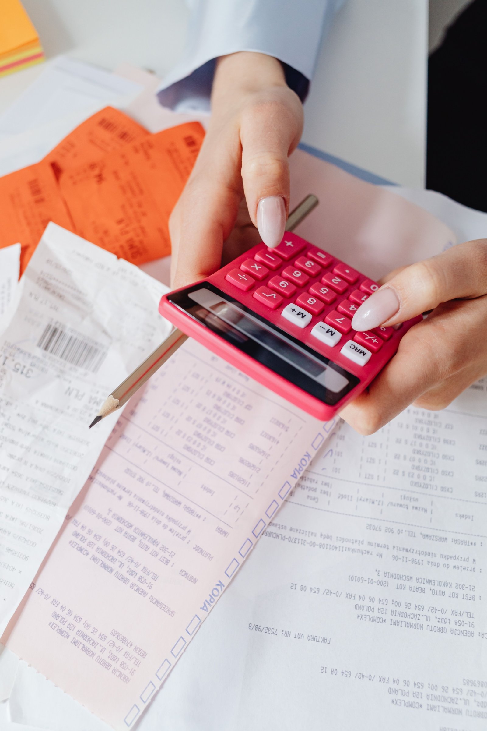 Homebuyer reviewing unexpected costs and additional expenses before purchasing a property.