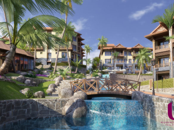 Exotic palm gardens and lush green landscaping covering 80% of U Residences Sahl Hasheesh